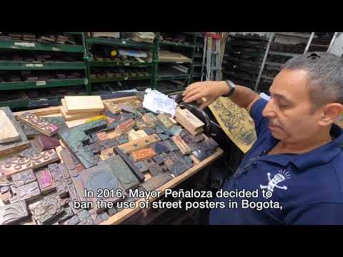 Printmaker displaying letterpress blocks at La Linterna